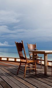 Preview wallpaper chairs, table, yard, coast, beach, tropics, terrace