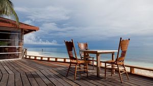 Preview wallpaper chairs, table, yard, coast, beach, tropics, terrace