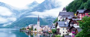 Preview wallpaper chapel, buildings, lake, mountains, clouds