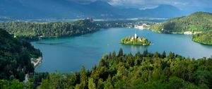 Preview wallpaper chapel, island, lake, trees, mountains