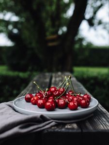 Preview wallpaper cherries, cherry, dish, motion blur