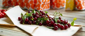 Preview wallpaper cherry, berries, leaves, parchment, macro