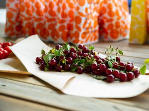 Preview wallpaper cherry, berries, leaves, parchment, macro