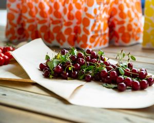 Preview wallpaper cherry, berries, leaves, parchment, macro