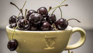 Preview wallpaper cherry, fruits, cup, drops, water