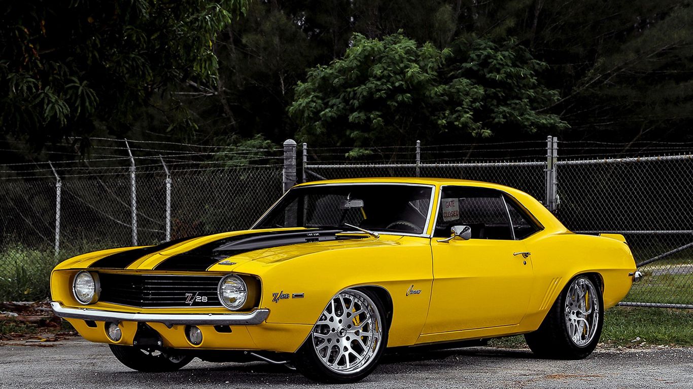 Download wallpaper 1366x768 chevrolet, camaro, 1969, yellow, side view  tablet, laptop hd background