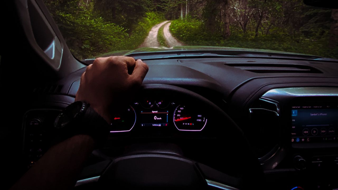 Wallpaper chevrolet, car, steering wheel, hand, forest