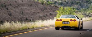 Preview wallpaper chevrolet corvette c5, chevrolet, yellow, back view, asphalt