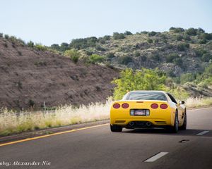 Preview wallpaper chevrolet corvette c5, chevrolet, yellow, back view, asphalt