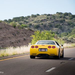 Preview wallpaper chevrolet corvette c5, chevrolet, yellow, back view, asphalt