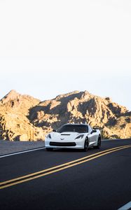 Preview wallpaper chevrolet corvette, chevrolet, car, sportscar, white, road, mountains