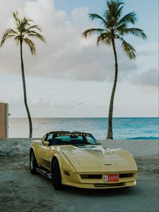 Preview wallpaper chevrolet corvette, chevrolet, car, yellow, retro, beach