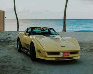 Preview wallpaper chevrolet corvette, chevrolet, car, yellow, retro, beach