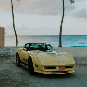 Preview wallpaper chevrolet corvette, chevrolet, car, yellow, retro, beach