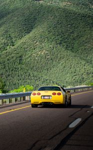 Preview wallpaper chevrolet corvette, chevrolet, car, yellow, back view