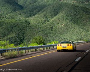 Preview wallpaper chevrolet corvette, chevrolet, car, yellow, back view