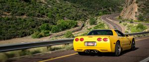 Preview wallpaper chevrolet corvette, chevrolet, car, yellow, back view, road