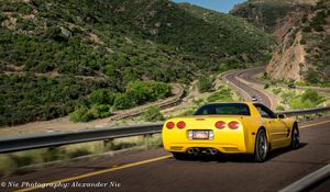 Preview wallpaper chevrolet corvette, chevrolet, car, yellow, back view, road