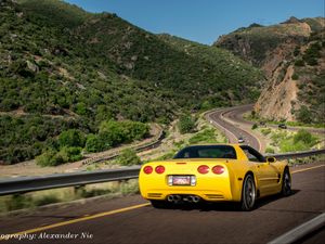 Preview wallpaper chevrolet corvette, chevrolet, car, yellow, back view, road