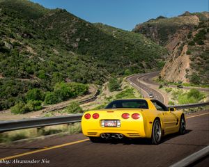 Preview wallpaper chevrolet corvette, chevrolet, car, yellow, back view, road