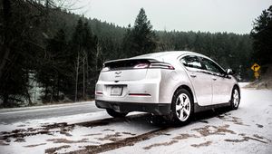 Preview wallpaper chevrolet volt, chevrolet, snowfall, side view, snow