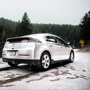 Preview wallpaper chevrolet volt, chevrolet, snowfall, side view, snow