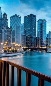Preview wallpaper chicago, llinois, illinois, usa, united states, city, evening, river, houses, buildings, skyscrapers, road, lighting, lights, bridge