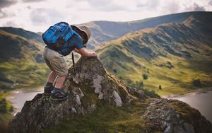 Preview wallpaper child, backpack, mountains, travel, nature