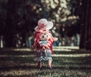 Preview wallpaper child, backpack, toy, park, walk