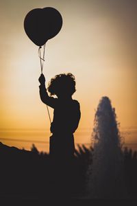 Preview wallpaper child, balloon, silhouette, sunset