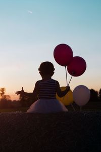 Preview wallpaper child, balloons, sunset