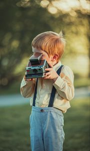 Preview wallpaper child, boy, camera, photographer, childhood