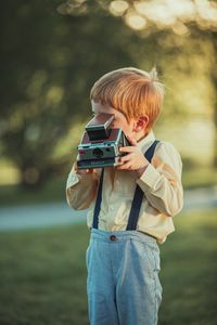 Preview wallpaper child, boy, camera, photographer, childhood