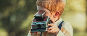 Preview wallpaper child, boy, camera, photographer, childhood