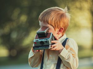 Preview wallpaper child, boy, camera, photographer, childhood