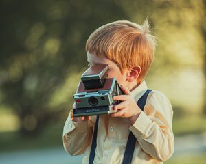 Preview wallpaper child, boy, camera, photographer, childhood