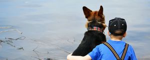 Preview wallpaper child, dog, beach, sand