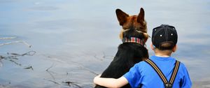 Preview wallpaper child, dog, beach, sand