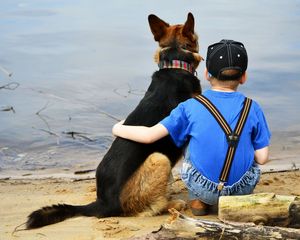 Preview wallpaper child, dog, beach, sand