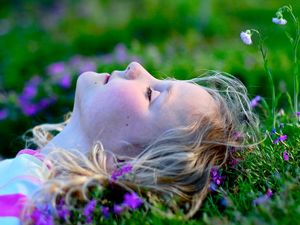 Preview wallpaper child, girl, lying, grass, relax