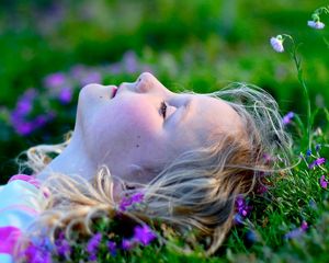 Preview wallpaper child, girl, lying, grass, relax