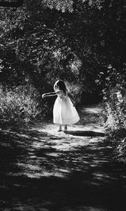 Preview wallpaper child, girl, walk, bw, childhood