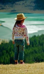 Preview wallpaper child, grass, hills, walking, nature, forest