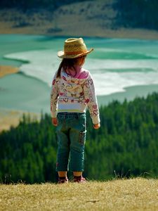 Preview wallpaper child, grass, hills, walking, nature, forest