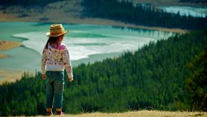 Preview wallpaper child, grass, hills, walking, nature, forest