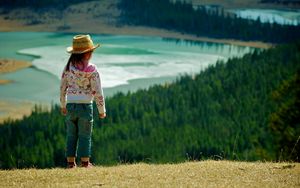 Preview wallpaper child, grass, hills, walking, nature, forest