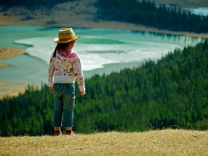 Preview wallpaper child, grass, hills, walking, nature, forest