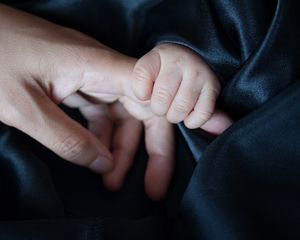 Preview wallpaper child, hand, parent, care, touch, love
