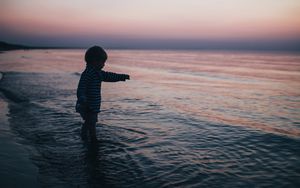 Preview wallpaper child, kid, childhood, sea, sunset