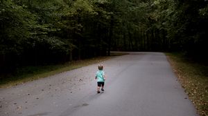 Preview wallpaper child, run, road, forest, asphalt